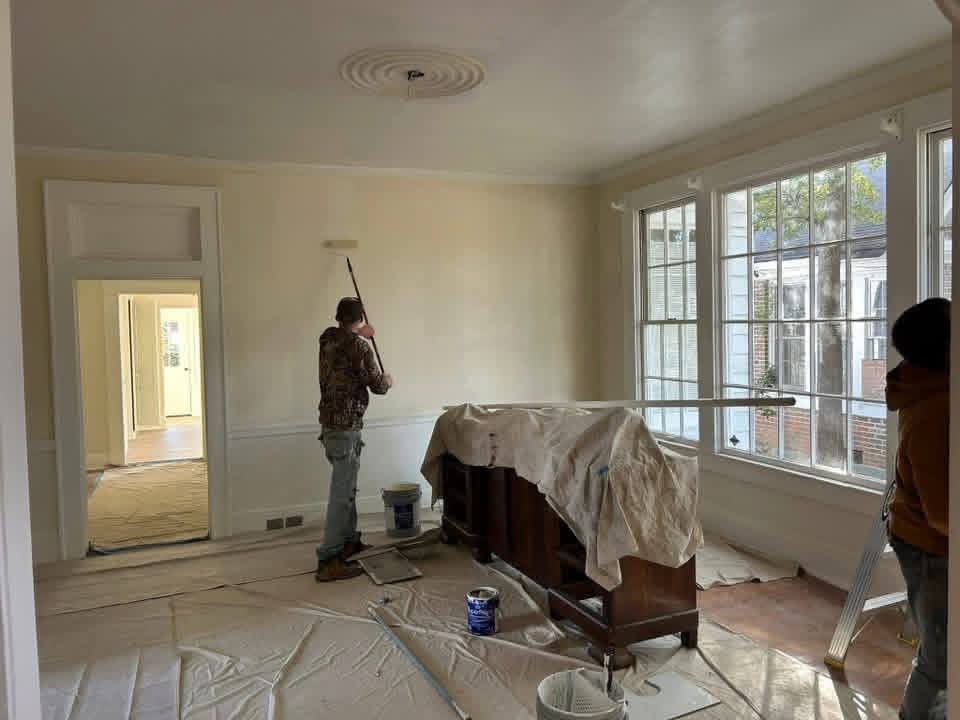 Interior wall being painted with a roller