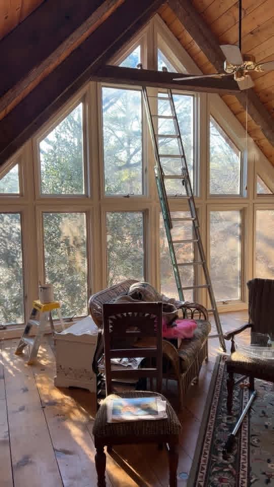 Painted interior with vaulted ceiling and tall windows