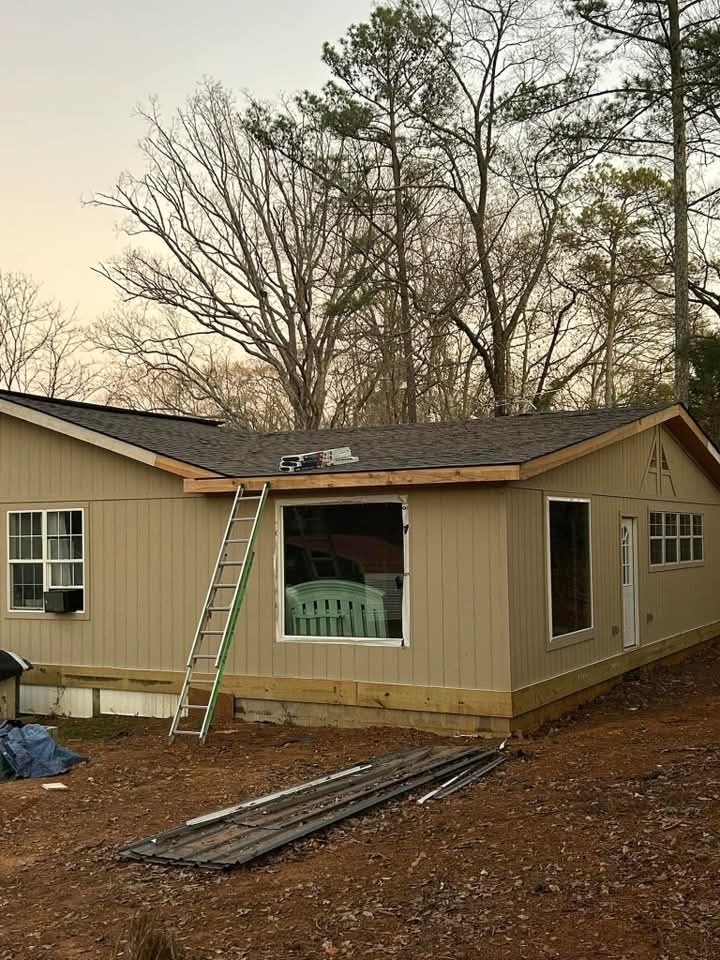 Roof shingles being replaced on a home